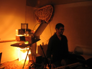 Phil Skaller setting up: his rollup keyboard, horns, bells, whistles...