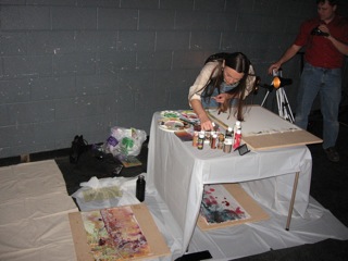 Live visual art being created around the stage...